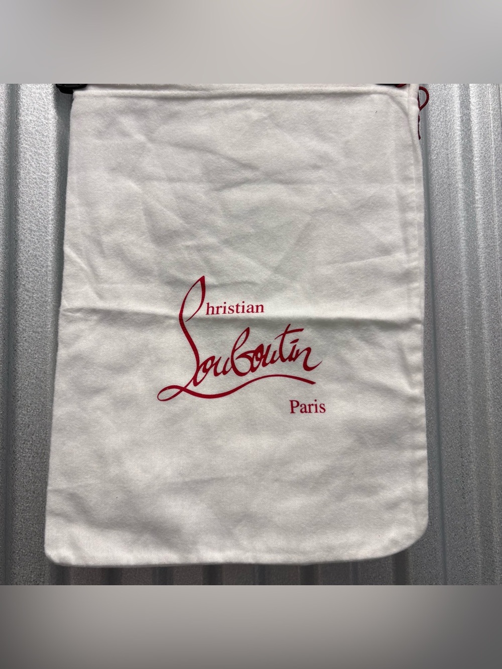 Christian Louboutin White felted drawstring dust bag